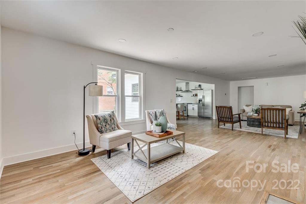 1321 Enderly Road Charlotte, NC 28208 - Photo 7 of 26 a living room with furniture and a table