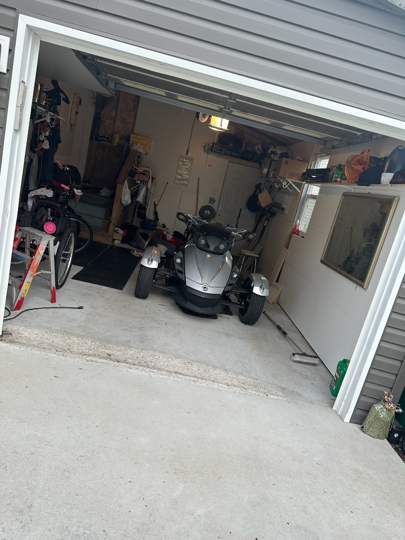 186 Northshore Road Elgin, IL 60123 - Photo 13 of 14 a view of a garage with rack and bicycle