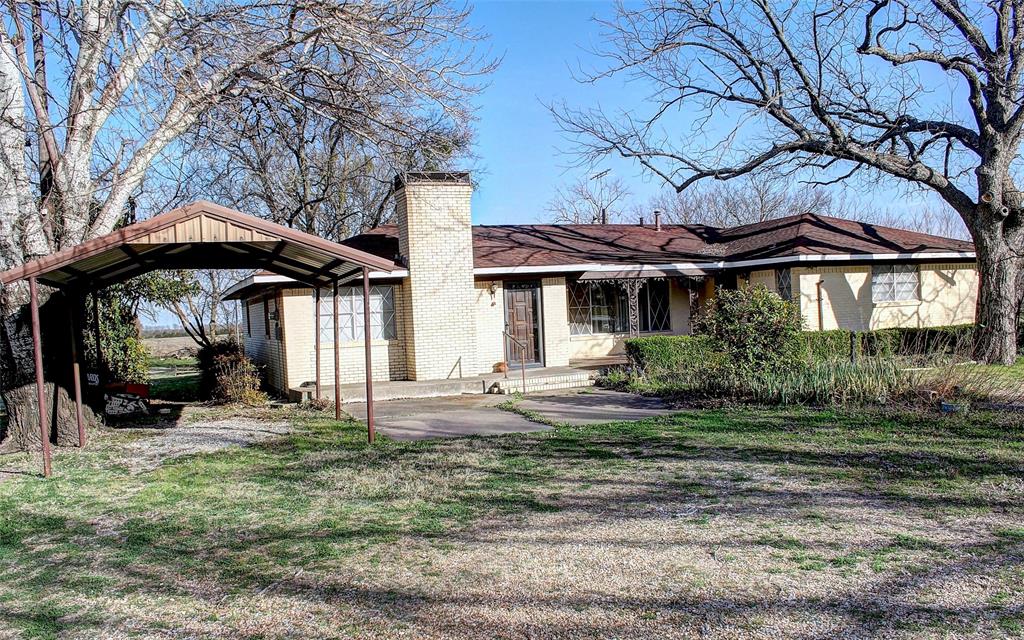 512 North Sherley Road Anna, TX 75409 - Photo 3 of 20 a front view of a house with garden