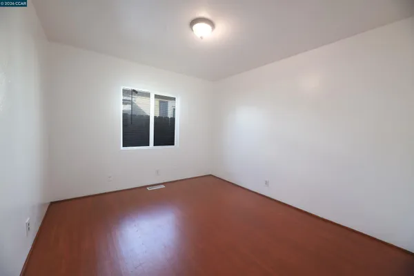 an empty room with a workspace