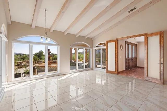 a view of an entryway with a white walls