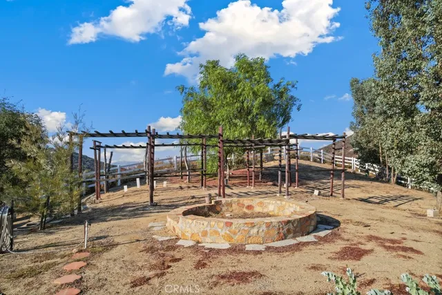 a view of a swimming pool with a lawn chairs