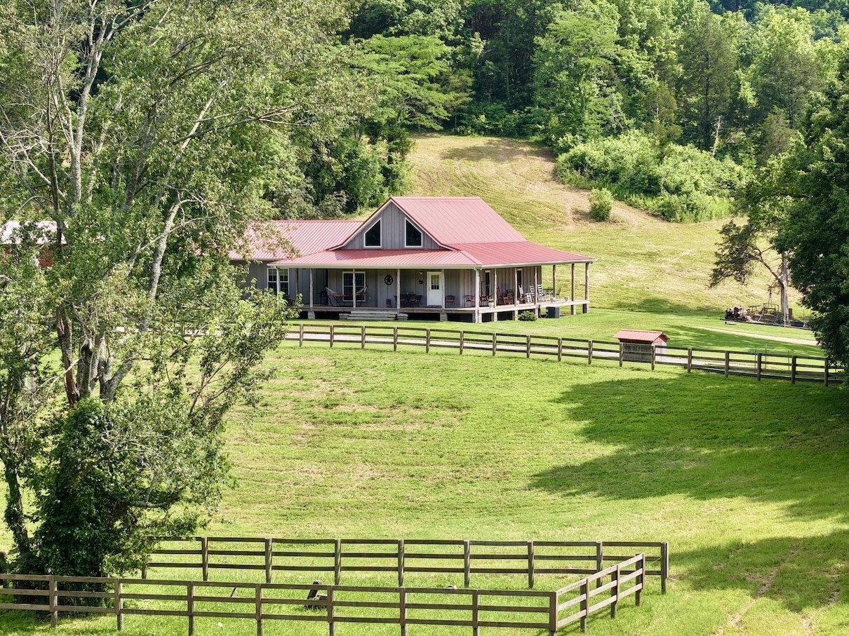 161 Fowler Road Woodbury, TN 37190 - Photo 13 of 69 a view of a swimming pool with an outdoor seating