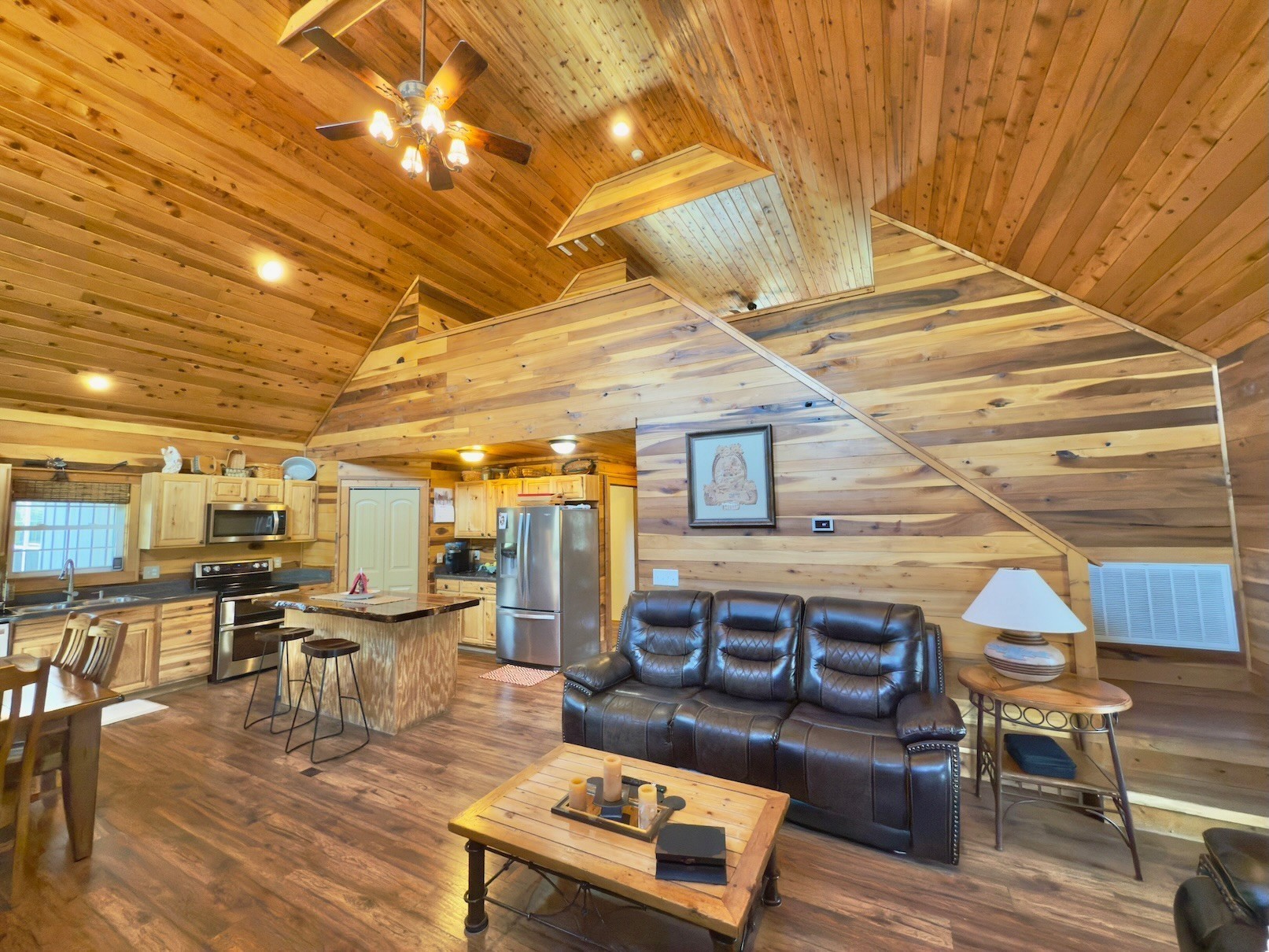 161 Fowler Road Woodbury, TN 37190 - Photo 19 of 69 a living room with lots of furniture and a wooden floor