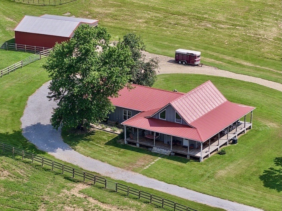161 Fowler Road Woodbury, TN 37190 - Photo 2 of 69 a aerial view of a house with swimming pool garden and lake view