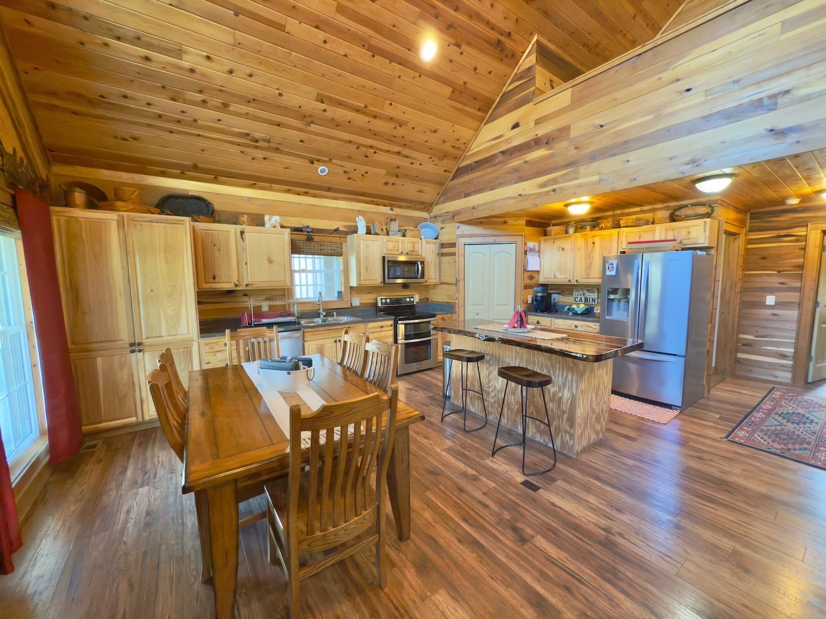 161 Fowler Road Woodbury, TN 37190 - Photo 21 of 69 a view of a dining room with furniture and wooden floor