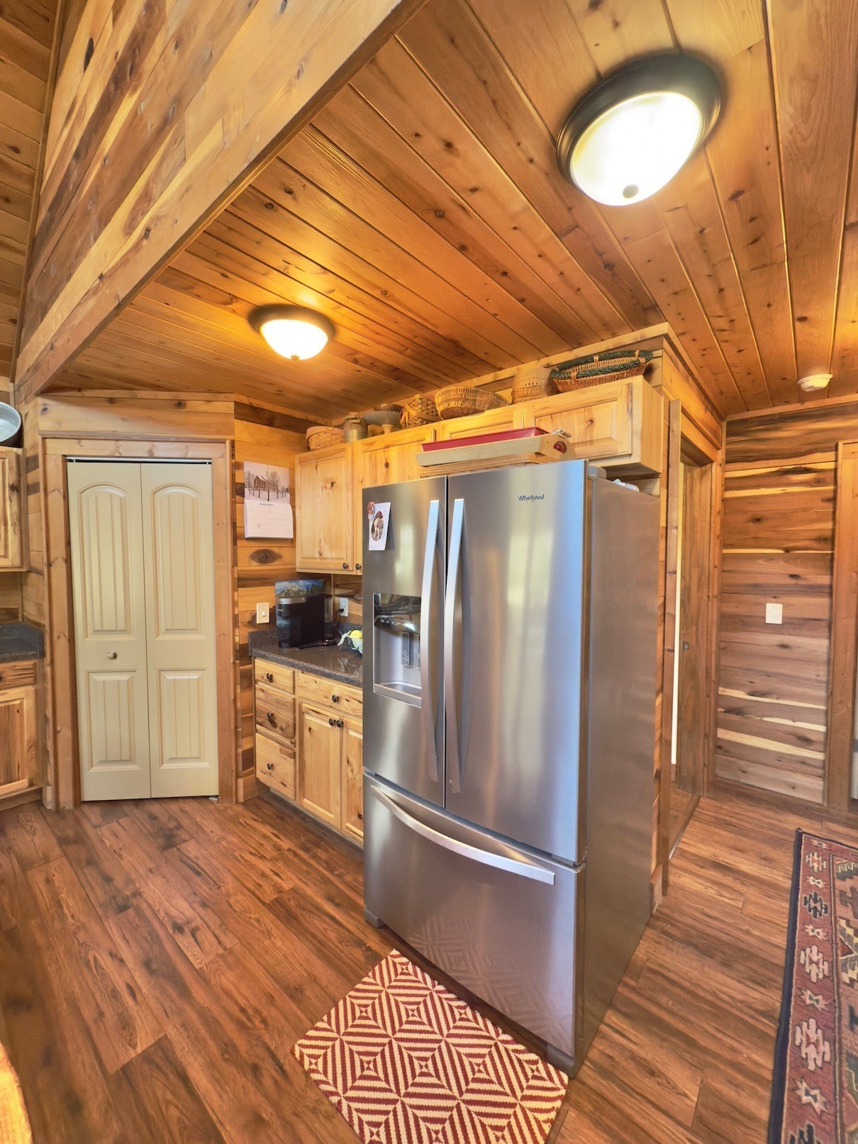 161 Fowler Road Woodbury, TN 37190 - Photo 22 of 69 a kitchen with granite countertop a refrigerator and a stove