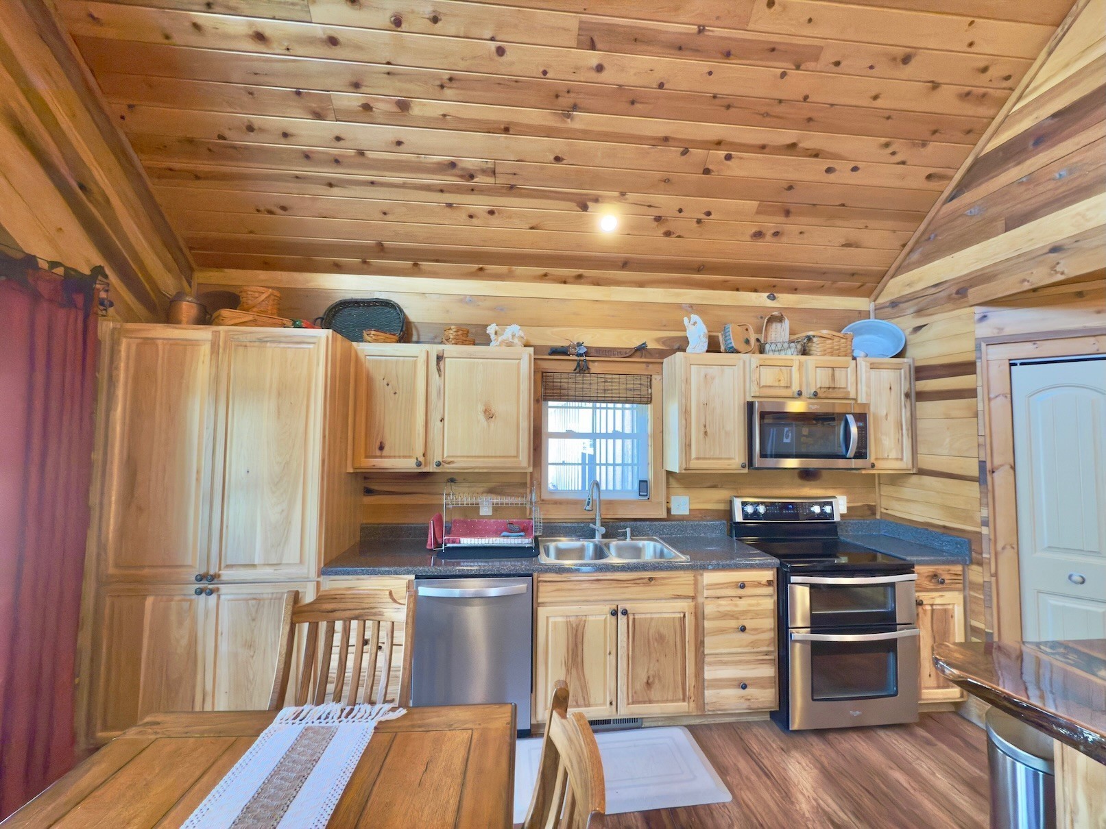 161 Fowler Road Woodbury, TN 37190 - Photo 23 of 69 a kitchen with stainless steel appliances a stove a refrigerator and cabinets