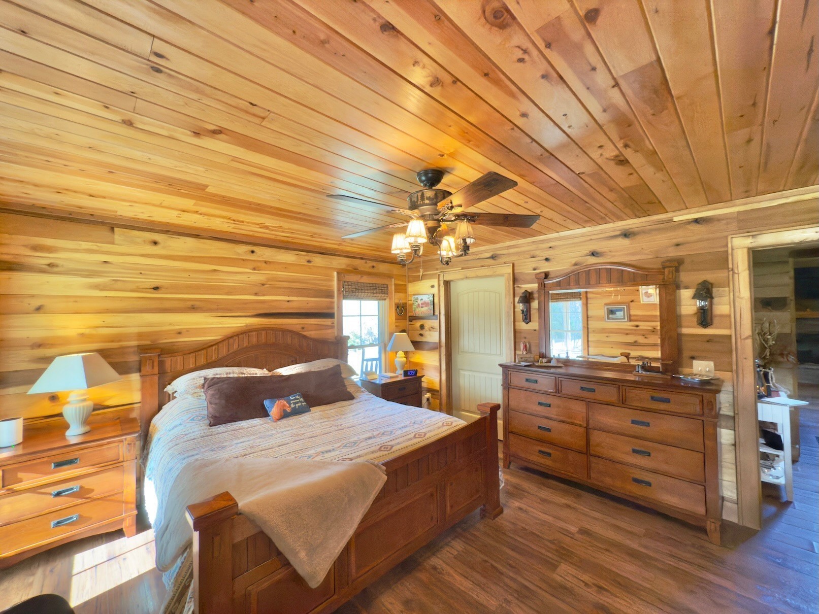 161 Fowler Road Woodbury, TN 37190 - Photo 28 of 69 a bedroom with a bed and wooden floor