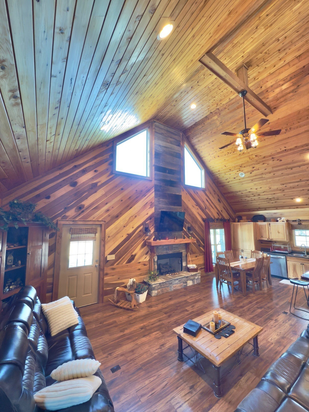 161 Fowler Road Woodbury, TN 37190 - Photo 44 of 69 a living room with furniture a table tennis table and a fireplace