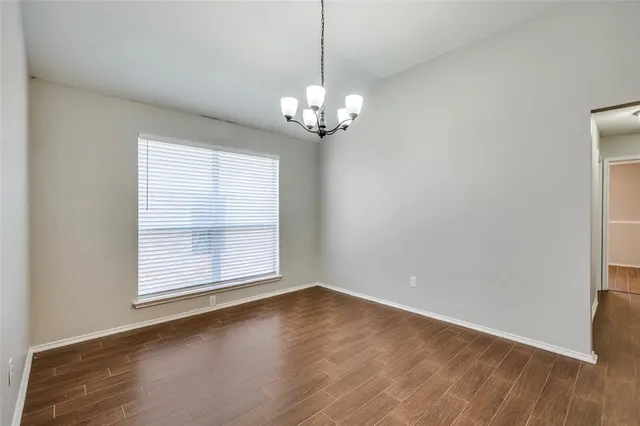 a view of a room with a large window