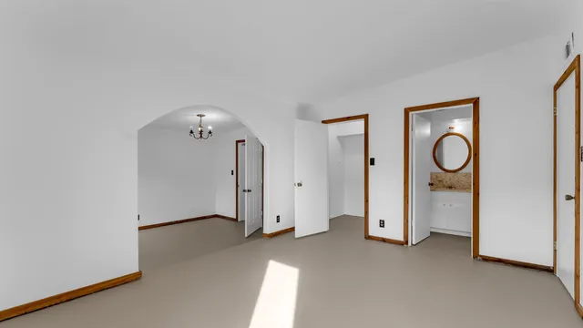 an empty room with windows