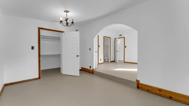 a bathroom with a sink a mirror and a shower