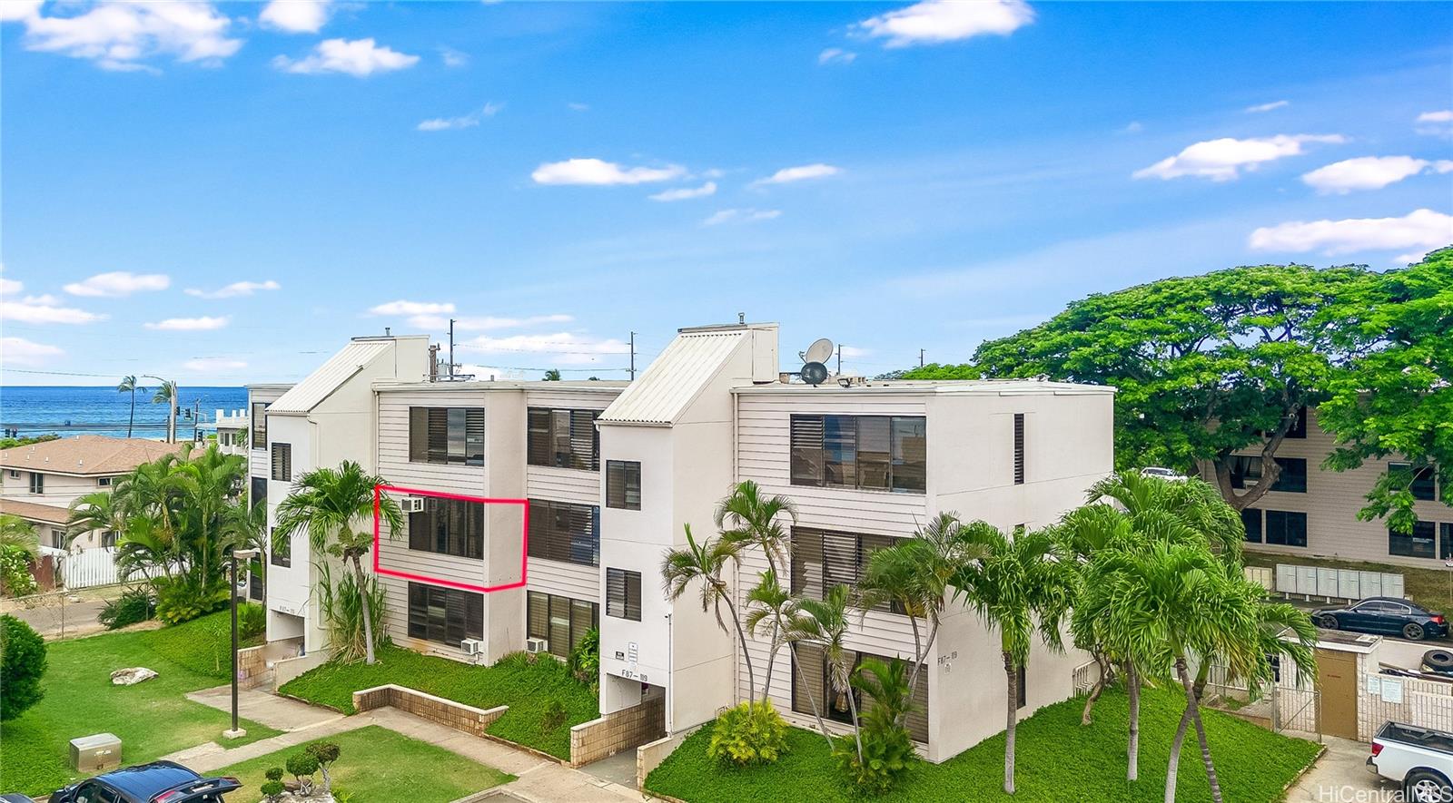 87-119 Helelua Street, Unit F202 Waianae, HI 96792 - Photo 17 of 25 a aerial view of a house with a yard and furniture