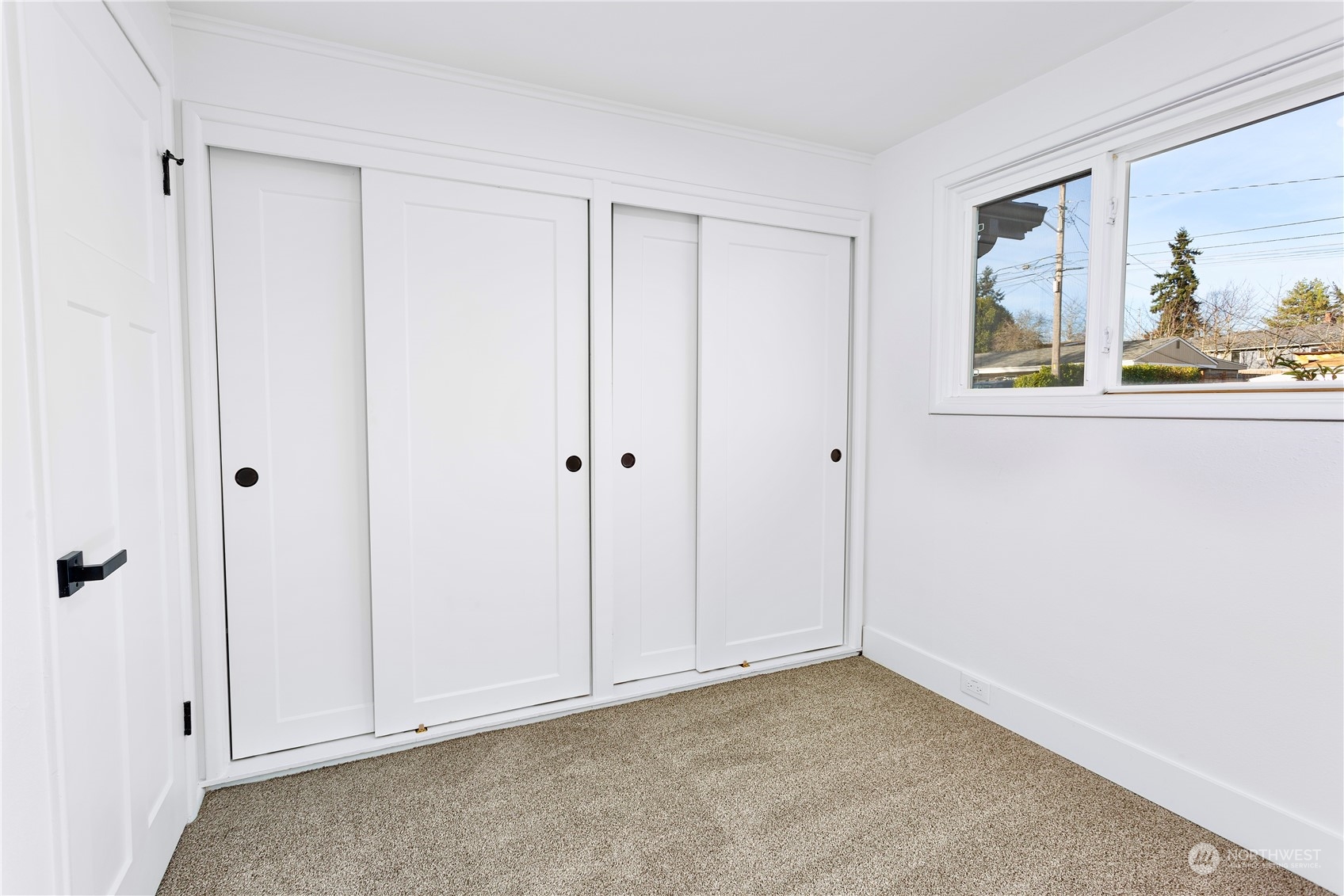 7922 Leschi Road Southwest Tacoma, WA 98498 - Photo 23 of 37 a view of room with window