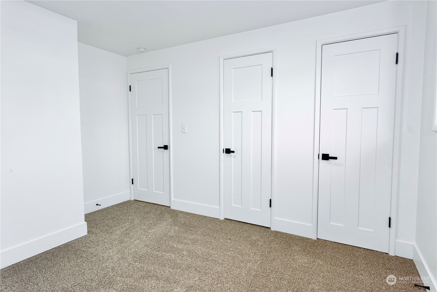 7922 Leschi Road Southwest Tacoma, WA 98498 - Photo 26 of 37 a view of room with white walls