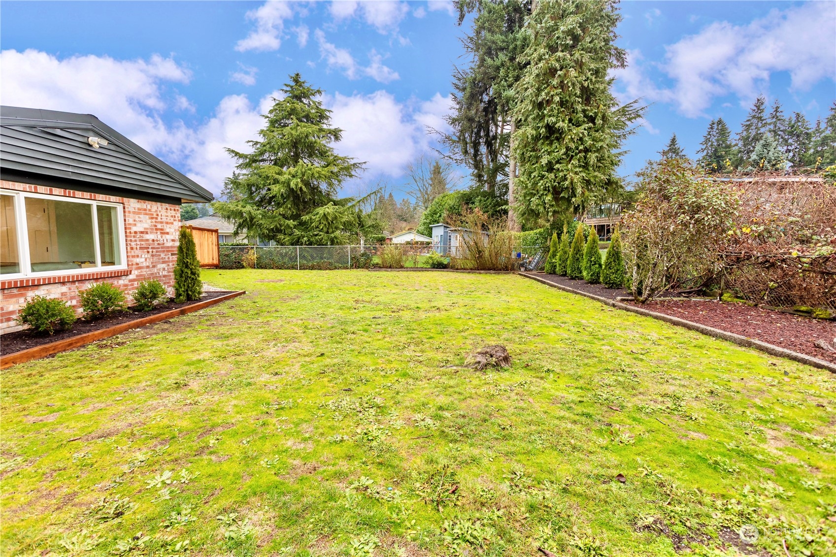 7922 Leschi Road Southwest Tacoma, WA 98498 - Photo 35 of 37 a view of an outdoor space and swimming pool