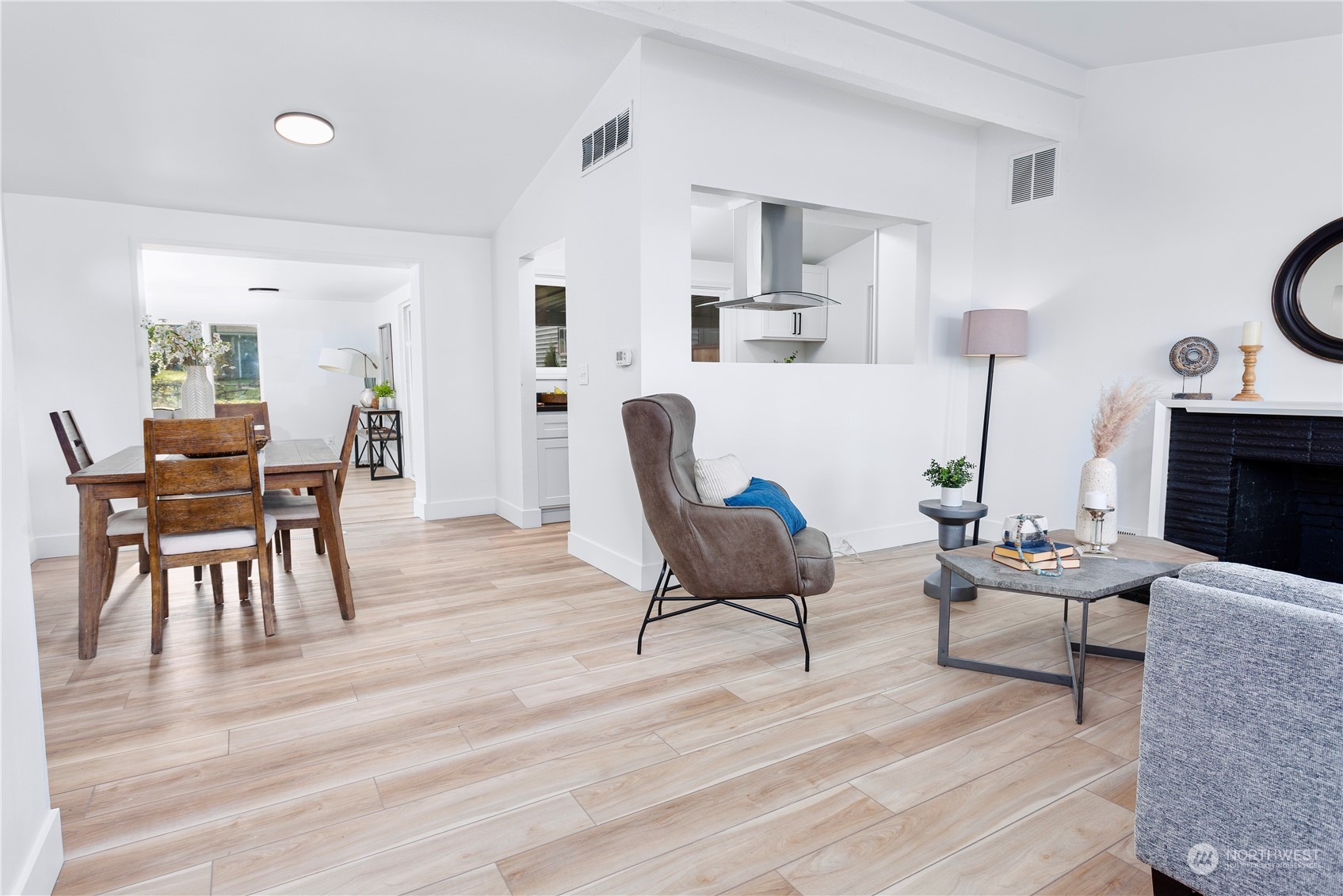 7922 Leschi Road Southwest Tacoma, WA 98498 - Photo 5 of 37 a living room with furniture and a wooden floor