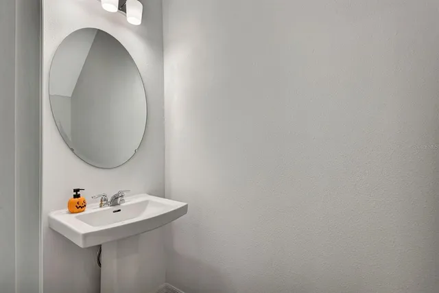 a view of storage and utility room with washer and dryer