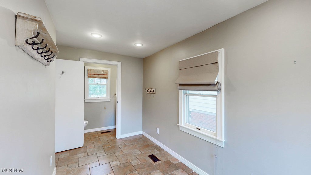 3286 Clarendon Road Cleveland, OH 44118 - Photo 16 of 41 Additional view of mud room with attached half bath.