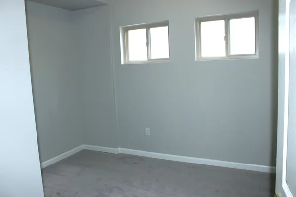 a bathroom with a bath tub and shower