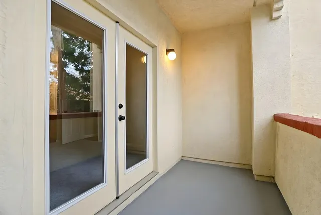 a view of a bathroom with a glass door