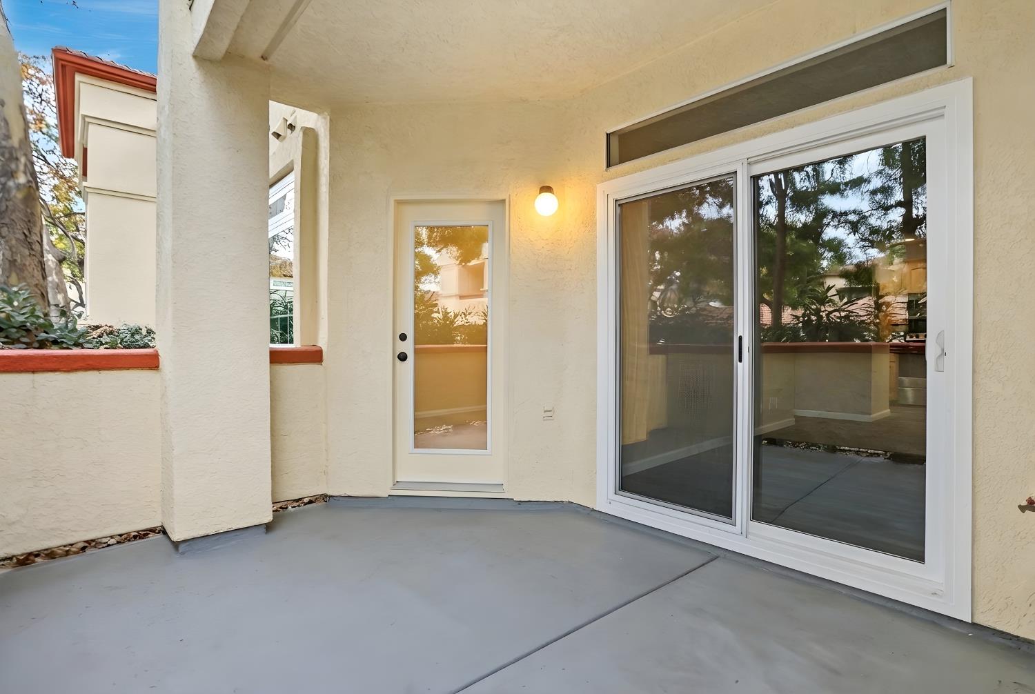 6986 Stagecoach Road, Unit B Dublin, CA 94568 - Photo 3 of 28 a view of a glass door with a glass door