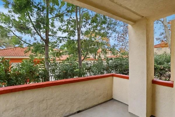 a view of a balcony with an outdoor space