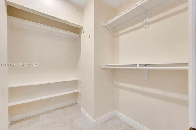 a bathroom with a shower and toilet