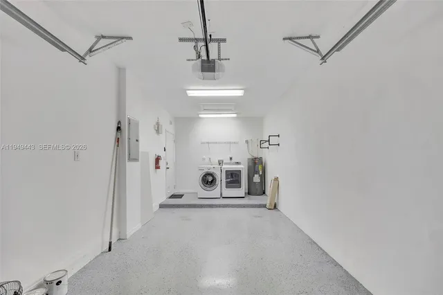 a front view of a house with large windows