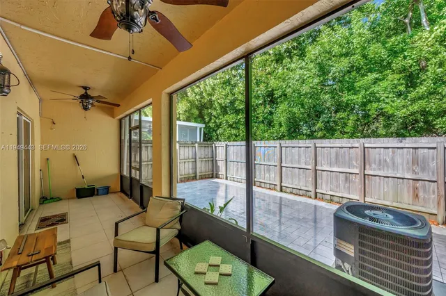 a view of backyard with deck