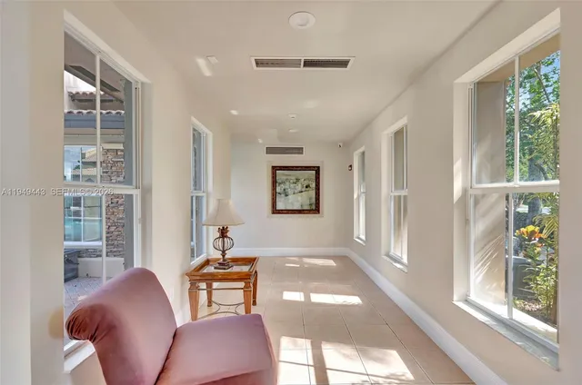 a view of a chair and tables in the garden