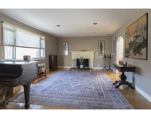 8 Helene Road Newton, MA 02468 - Photo 2 of 8 a living room with furniture and a fireplace
