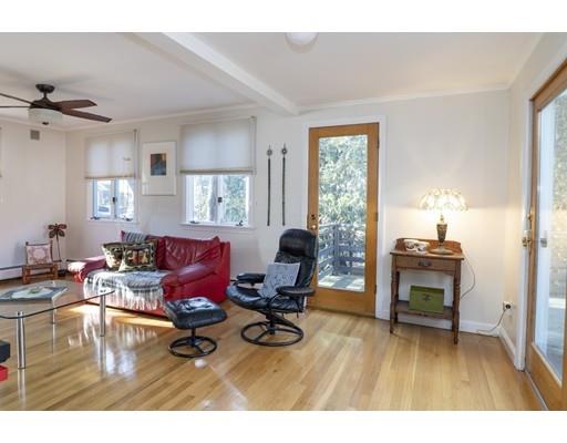 8 Helene Road Newton, MA 02468 - Photo 5 of 8 a living room with furniture and a wooden floor