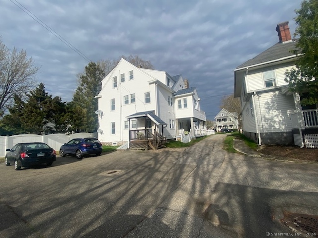 279 Wakelee Avenue Ansonia, CT 06401 - Photo 20 of 23 a view of a white house and a street
