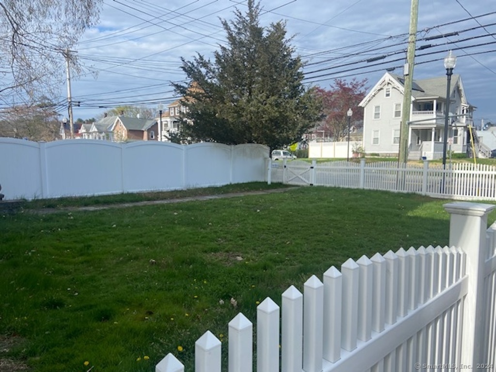 279 Wakelee Avenue Ansonia, CT 06401 - Photo 23 of 23 a view of a house with a yard