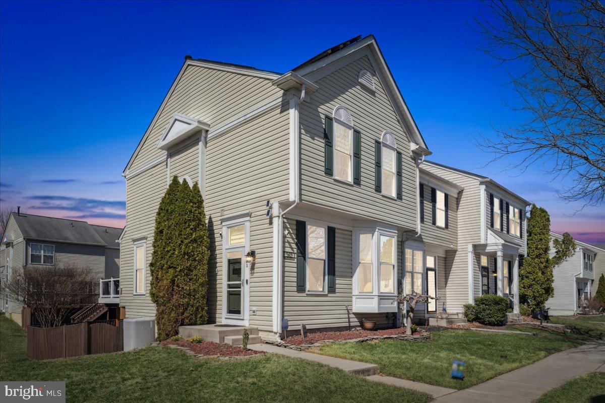262 Arcadia Shores Circle Odenton, MD 21113 - Photo 2 of 37 a front view of a house with a yard