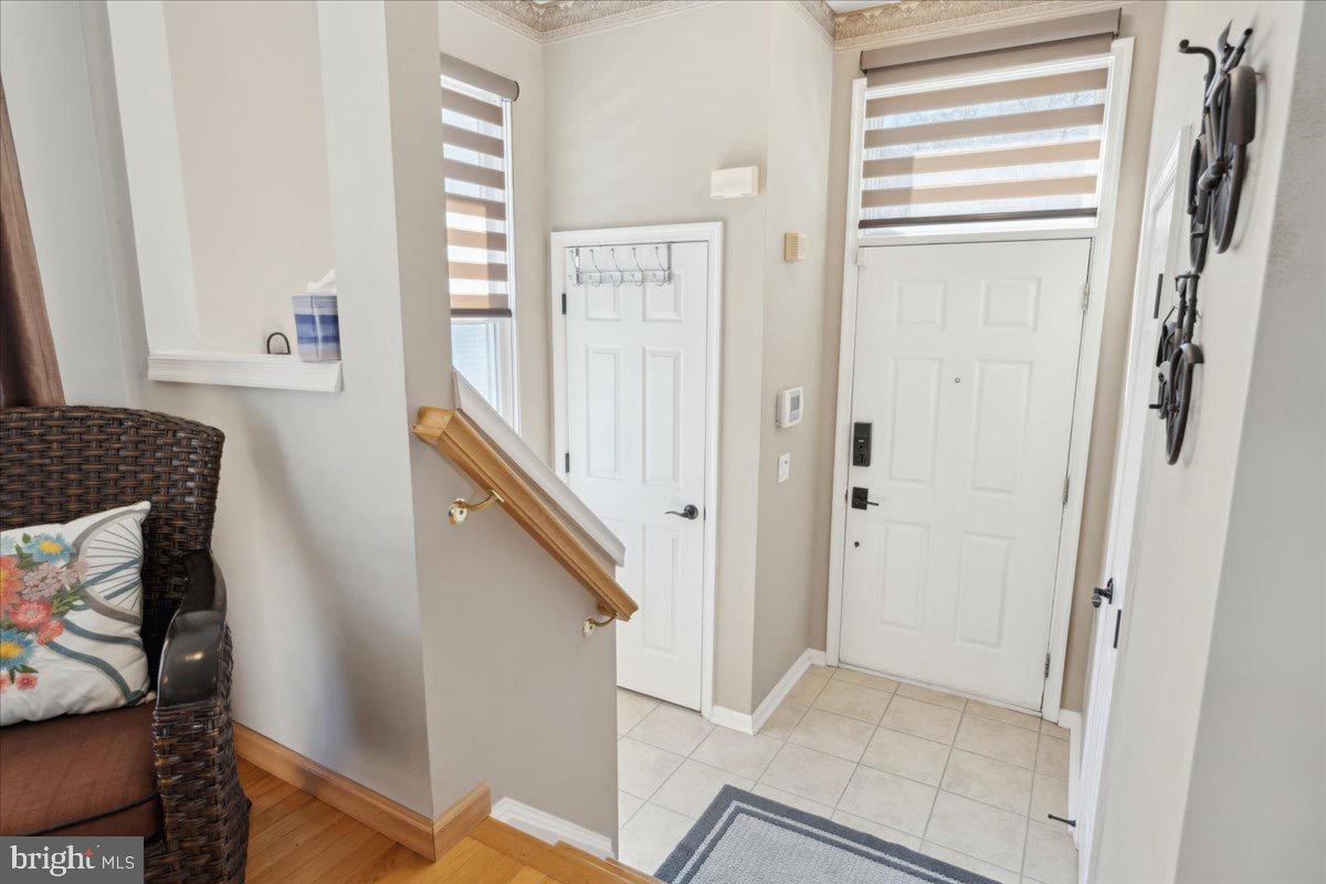 262 Arcadia Shores Circle Odenton, MD 21113 - Photo 5 of 37 a view of entryway with furniture and wooden floor