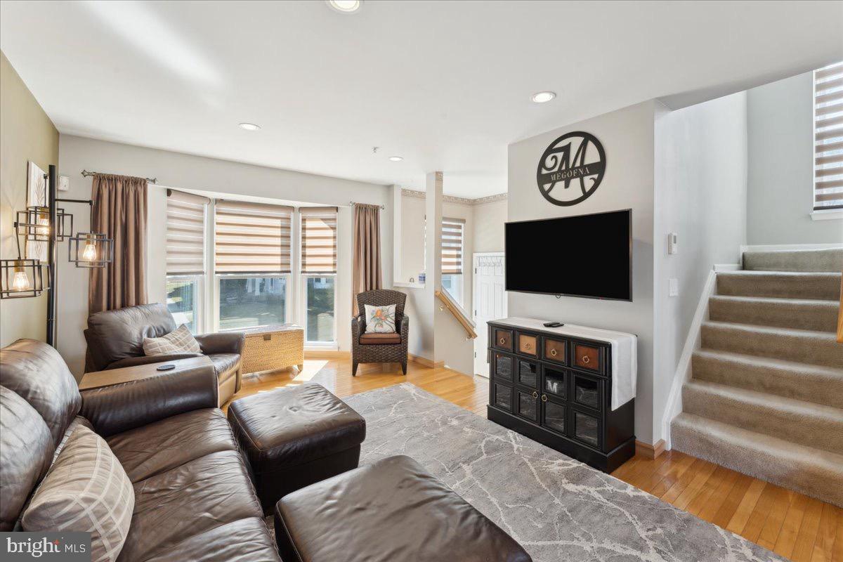 262 Arcadia Shores Circle Odenton, MD 21113 - Photo 7 of 37 a living room with furniture and a flat screen tv