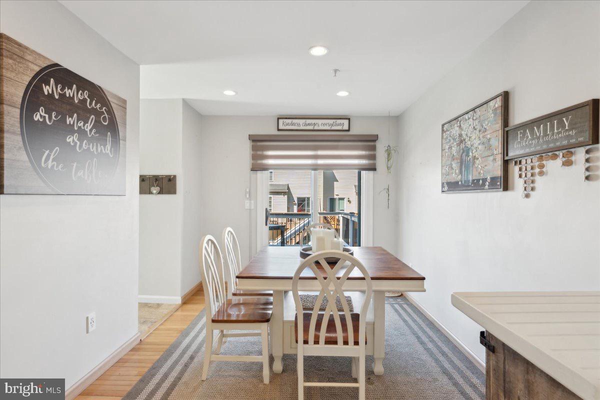 262 Arcadia Shores Circle Odenton, MD 21113 - Photo 8 of 37 a dining room with furniture and wooden floor