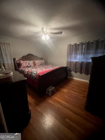 a room with furniture and a lamp