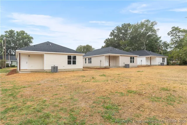 a house with yard in front of it