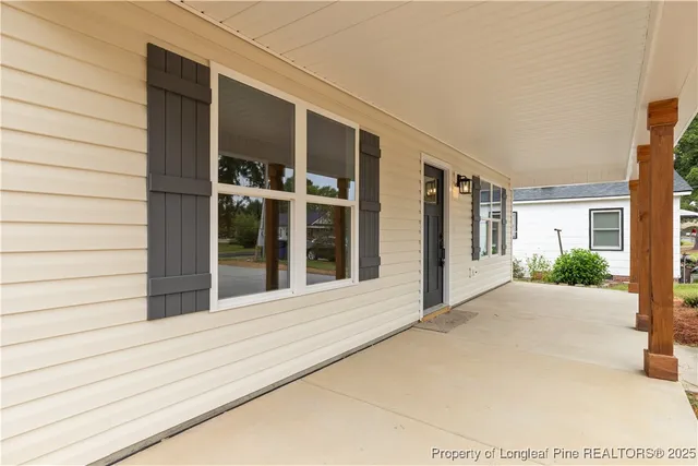 a view of a house with a large window