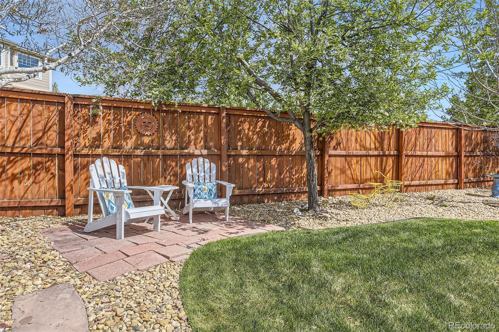 20040 East Doane Drive Aurora, CO 80013 - Photo 25 of 28 a view of a chairs and table in patio