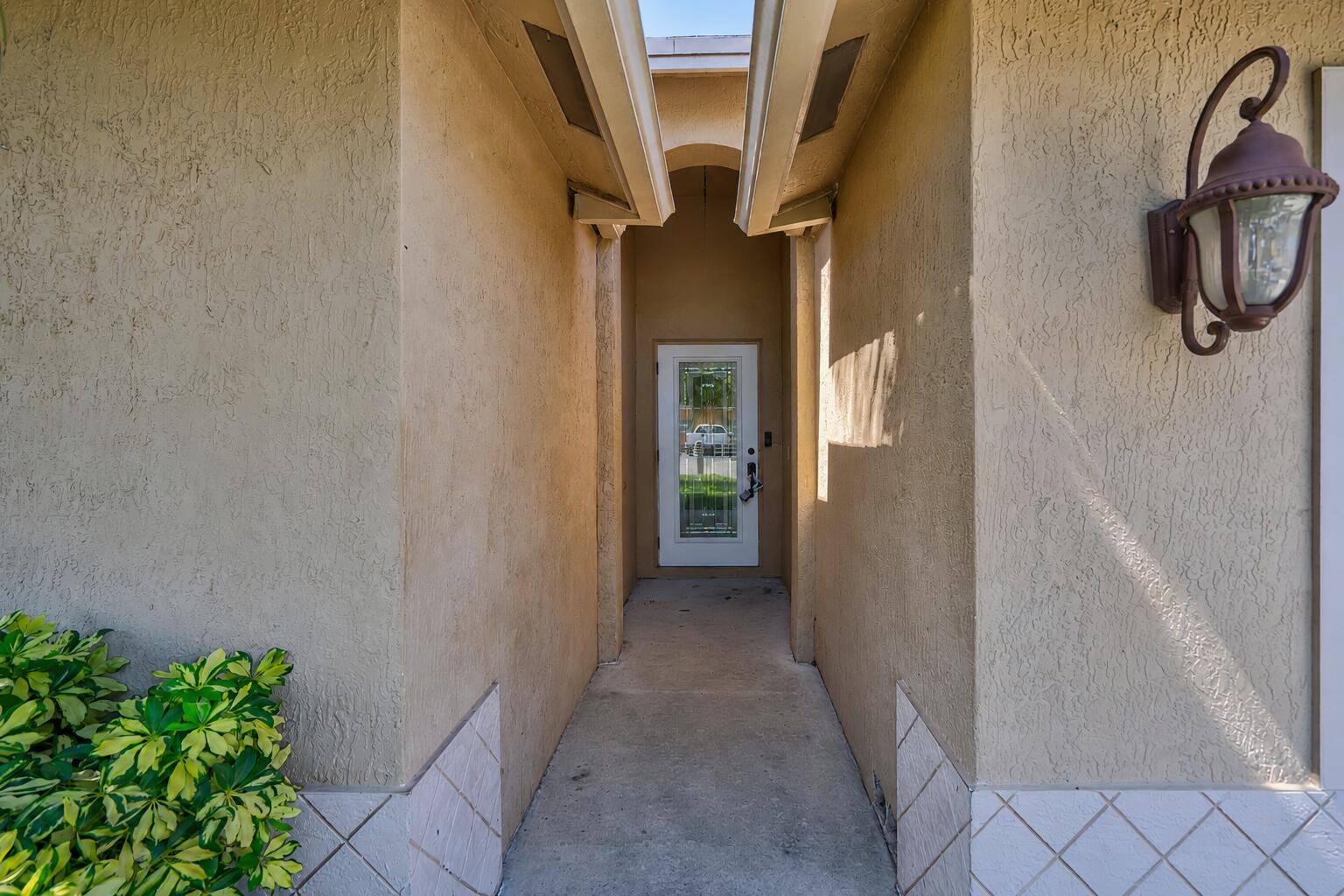 2241 Northwest 3rd Street Pompano Beach, FL 33069 - Photo 4 of 27 a view of hallway with shower