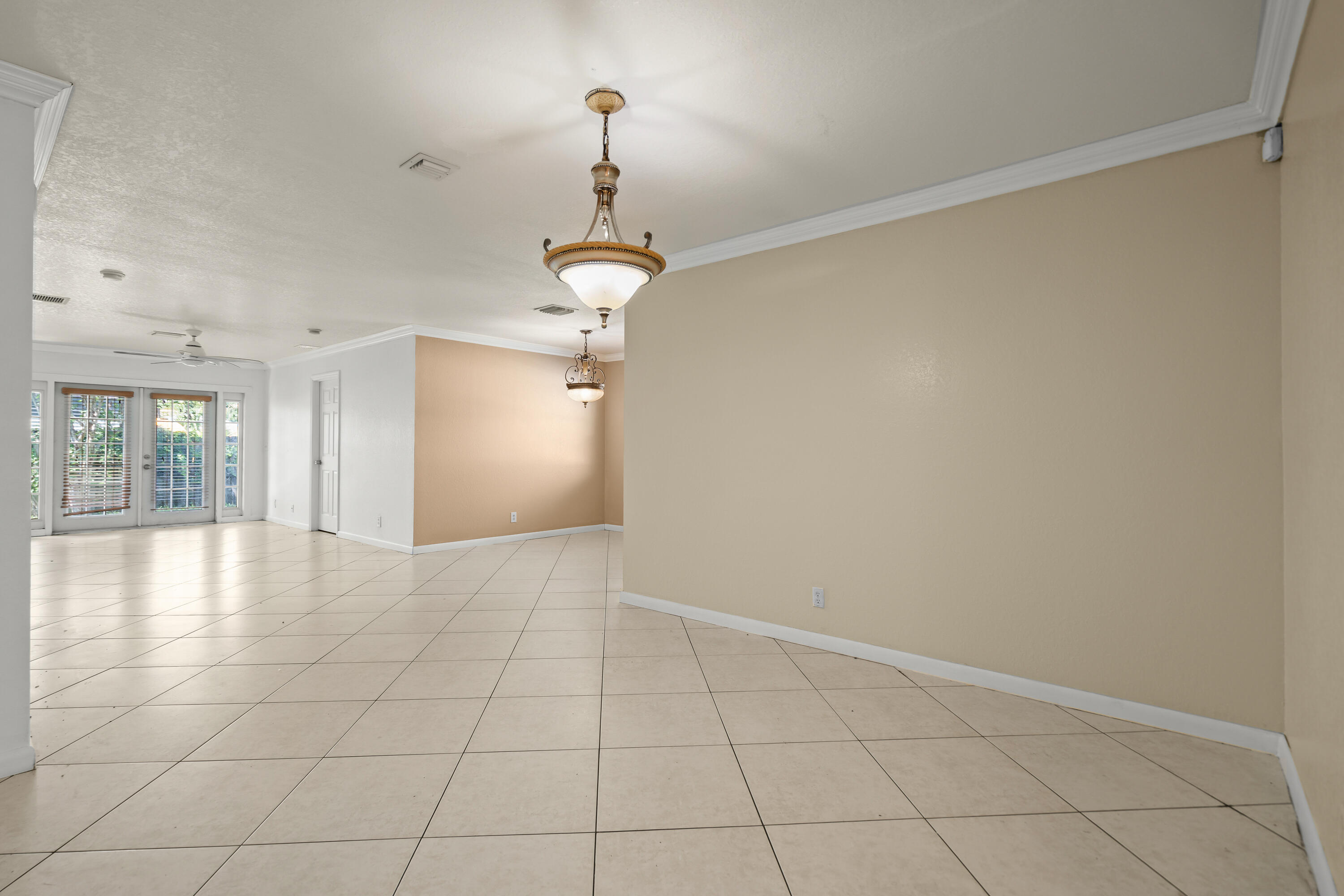 2241 Northwest 3rd Street Pompano Beach, FL 33069 - Photo 5 of 27 a view of an empty room with a window