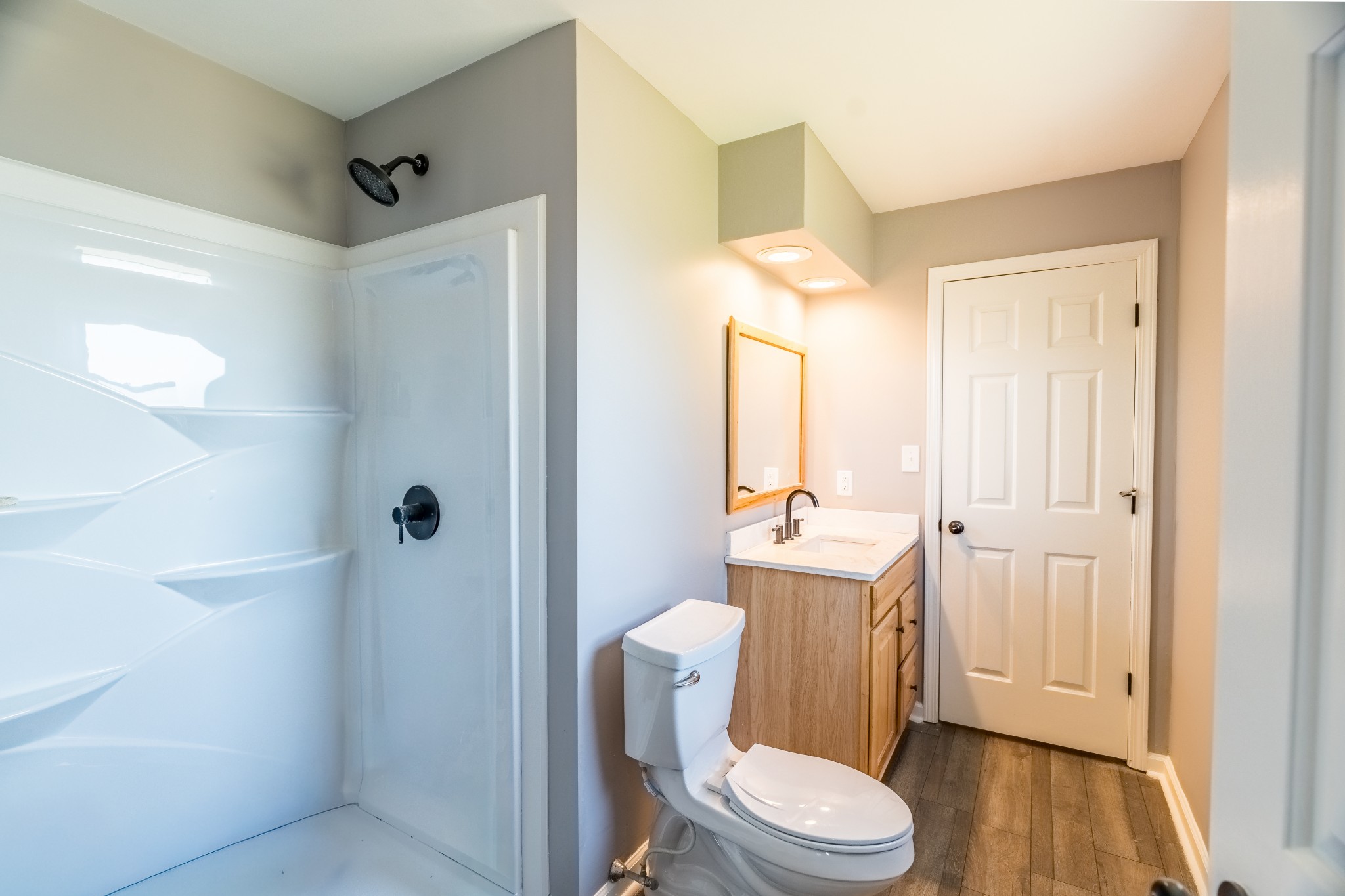 7135 Harmony Grove Road Crofton, KY 42217 - Photo 11 of 37 a bathroom with a sink a toilet and shower