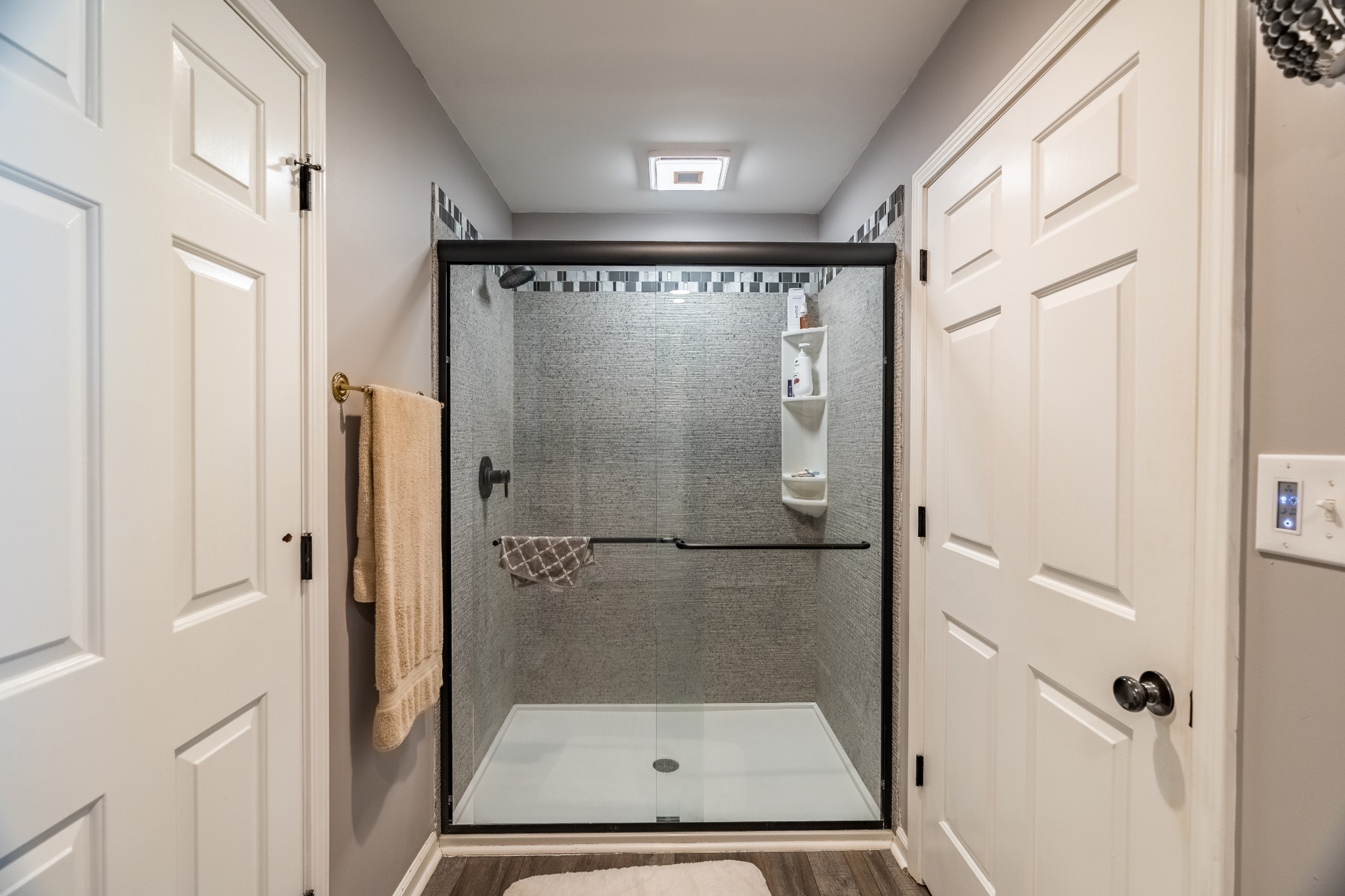 7135 Harmony Grove Road Crofton, KY 42217 - Photo 13 of 37 a bathroom with a glass shower door