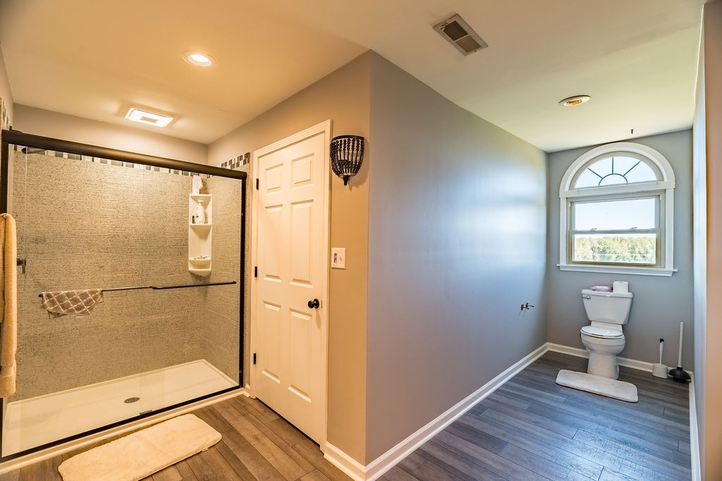 7135 Harmony Grove Road Crofton, KY 42217 - Photo 15 of 37 a bathroom with a shower and a toilet