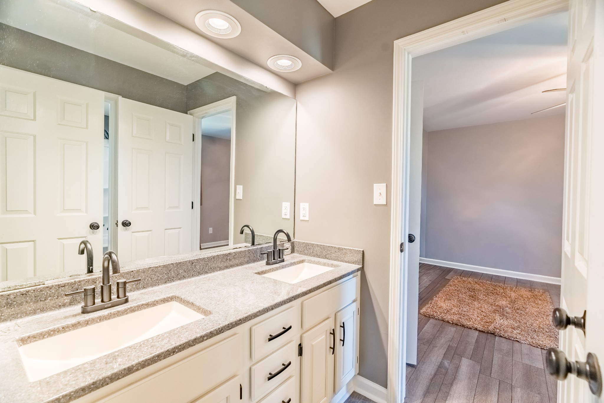 7135 Harmony Grove Road Crofton, KY 42217 - Photo 16 of 37 a bathroom with a sink and a mirror